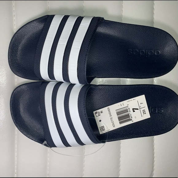 navy blue adidas slides